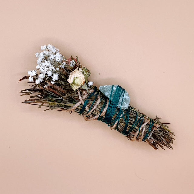 Invite prosperity, balance, and vibrant energy into your space with the Minted Fortune Smudge Stick