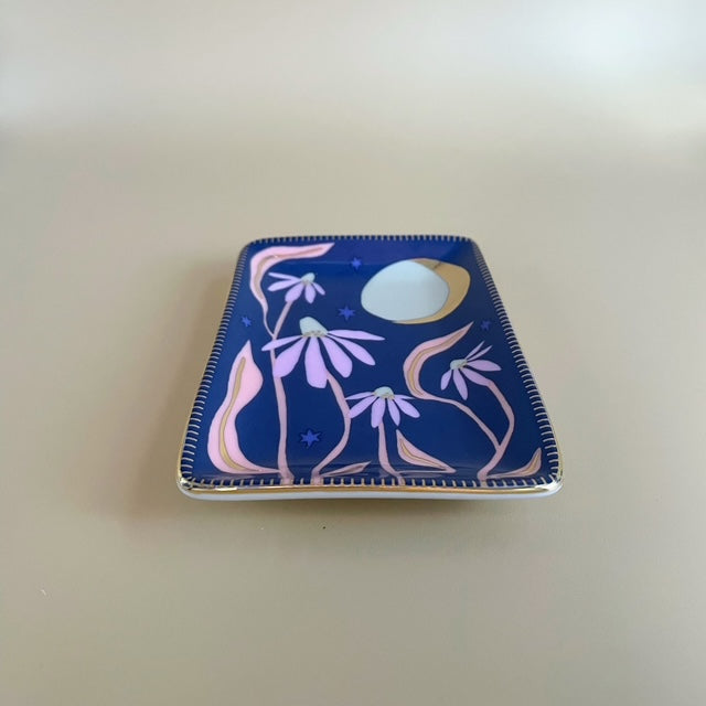 Add a touch of charm to your nightstand or dresser with Moonlight in the Garden