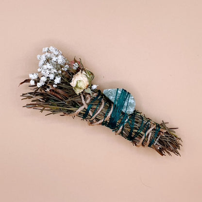 Invite prosperity, balance, and vibrant energy into your space with the Minted Fortune Smudge Stick