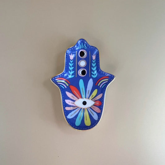 Invite positive energy and meaningful design into your space with the Chakra Blossom Hamsa Tray