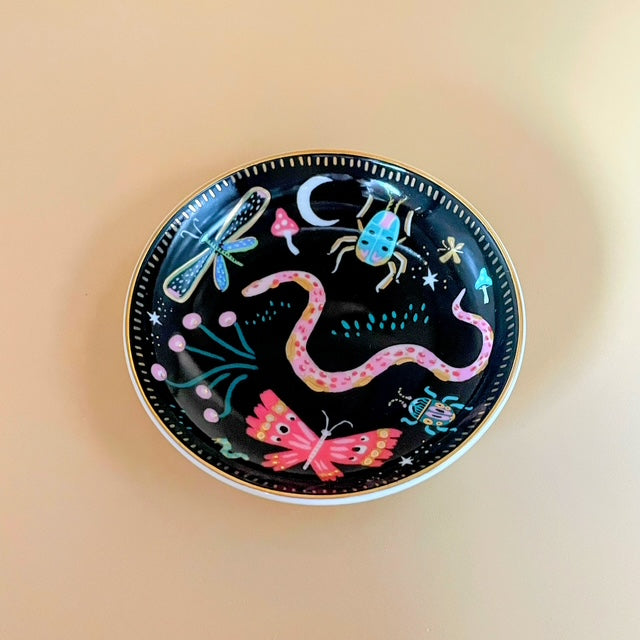 Step into an enchanting nightscape with the Enchanted Garden Trinket Tray