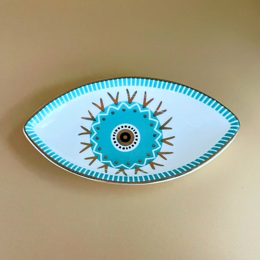 Bring balance, beauty, and protection into your space with the Guardian’s Eye Ceramic Trinket Tray